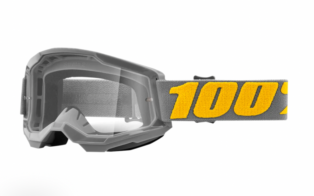 100% Strata2 mountain bike goggles with grey and yellow exterior and clear lens 